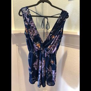Blue floral romper from Cinnamon Girl